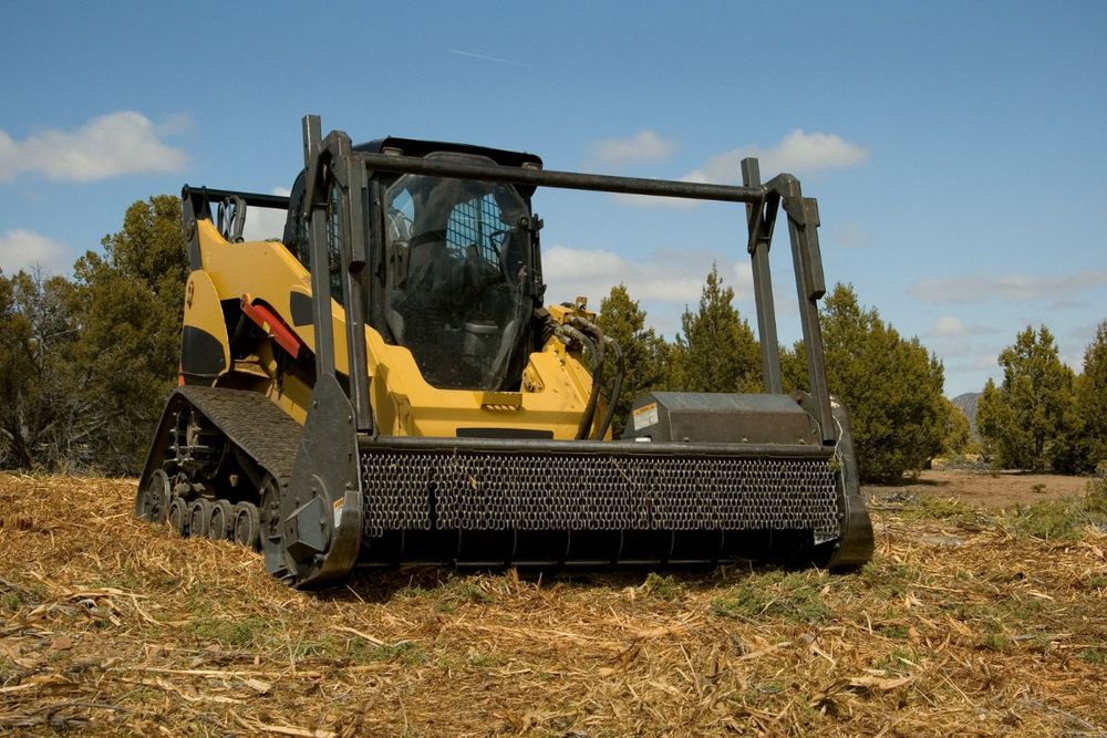 Our Forestry Mulching service helps homeowners clear land efficiently by using specialized equipment to grind vegetation into mulch, promoting healthier soil and reducing fire hazards on their property. for Benefield Dirt & Trucking in Monroe, LA