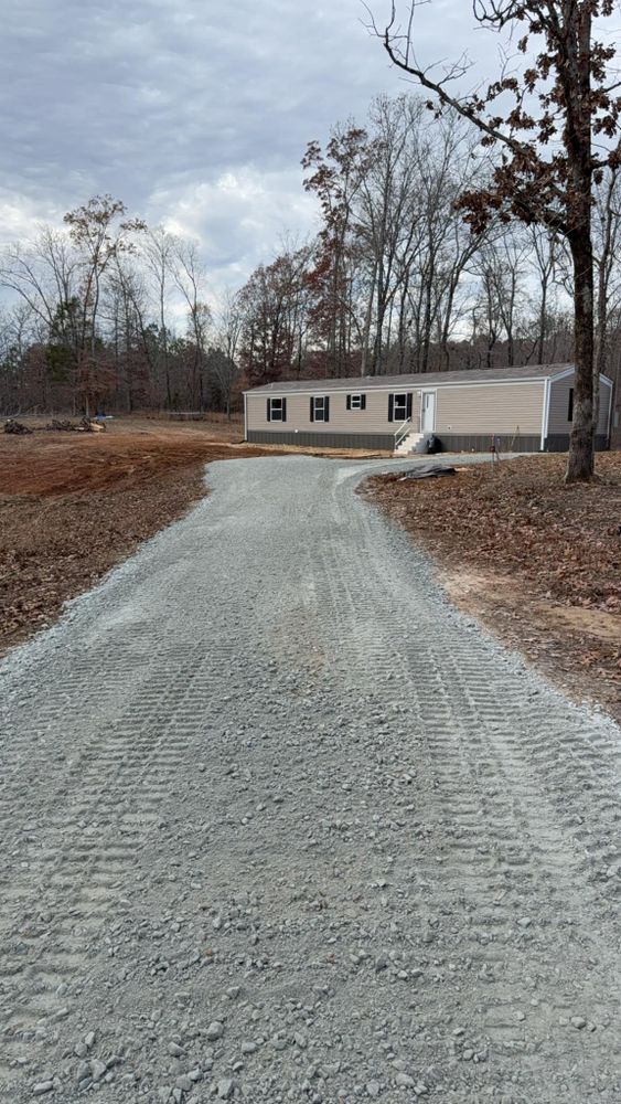 Our Roadbeds service provides expert installation and maintenance, ensuring a durable foundation for your driveways or pathways, enhancing stability and longevity while seamlessly integrating with your property's unique landscape. for West TN Dirt Works in Lexington, TN