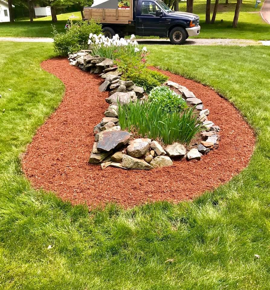 Mulch is used to help maintain the health of your landscape and adds a professional touch to any planter. It can be placed over soil to lock in moisture and improve soil conditions to encourage a healthier lawn. We provide a variety of professional mulching services. for Synhorst Property Maintenance & Landscaping in Connecticut, CT