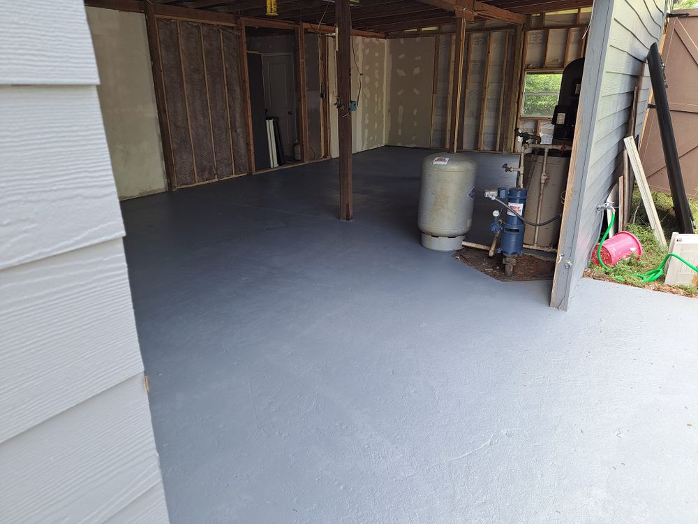 Enhance your home's durability and aesthetics with our Concrete Coatings service, offering long-lasting protection and a stylish finish for driveways, patios, and garage floors tailored to your unique needs. for Red Knight Painting in Daytona Beach, FL