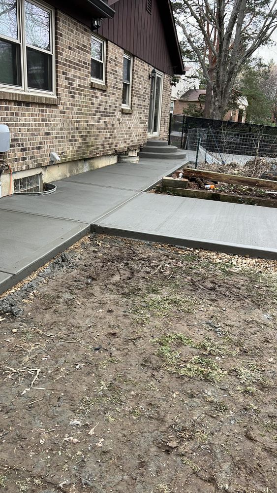 Our sidewalk installation services provide durable, aesthetically pleasing walkways that enhance curb appeal and ensure safety. Trust our expert team for precise construction tailored to suit your home's unique landscape needs. for Davies Concrete and Construction in Columbus, OH