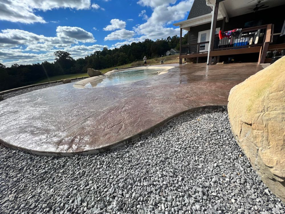 Enhance your home's appeal with our expert stamped concrete installation. We offer durable, beautiful designs customizable to fit any style, ensuring a perfect blend of functionality and aesthetic charm for your outdoor spaces. for Rocky Top Concrete & Excavating in Knoxville, TN