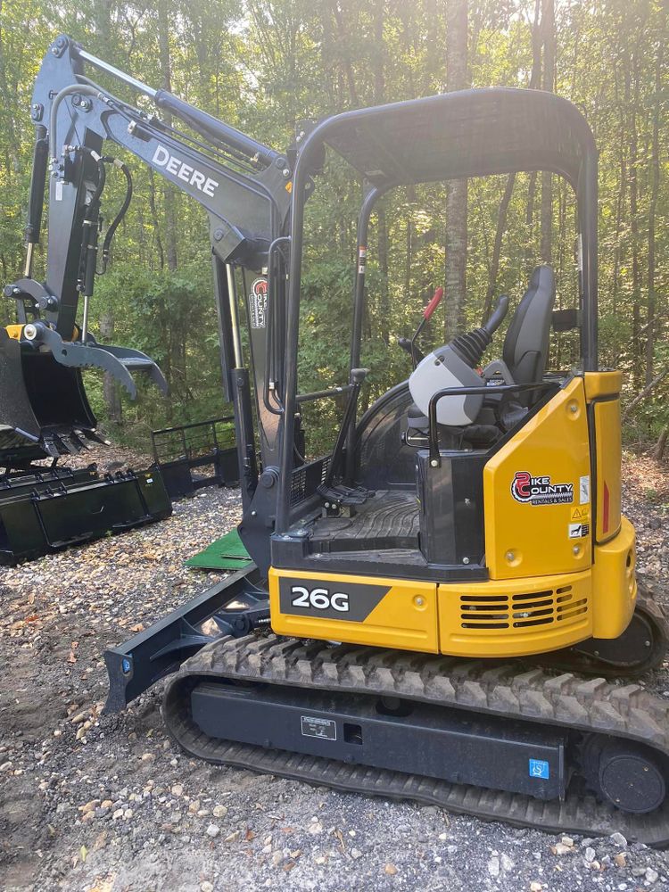 Our Equipment service offers top-quality tractors and machinery for all your residential needs. From grading to landscaping, we provide reliable equipment to make your property maintenance tasks easier and more efficient. for Pike County Rentals & Sales in Concord, GA