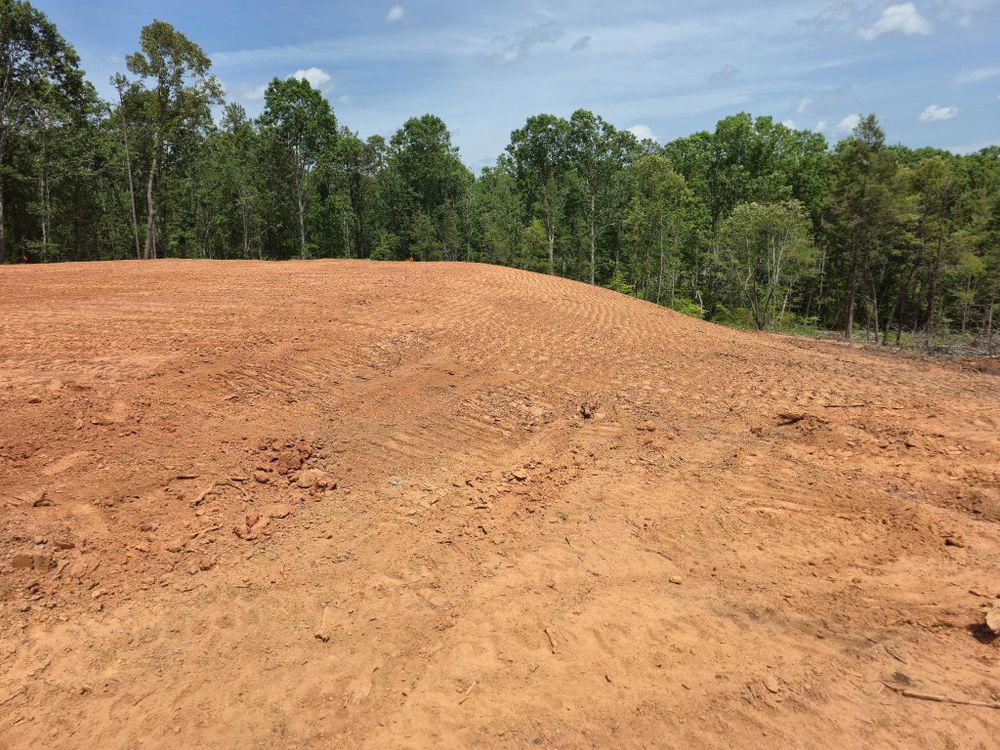 Our Site Preparation service ensures a solid foundation by expertly clearing, grading, and leveling land. We handle every project with precision to prepare your site for efficient construction and development. for Heldapay Hauling & Grading in Charlotte, SC