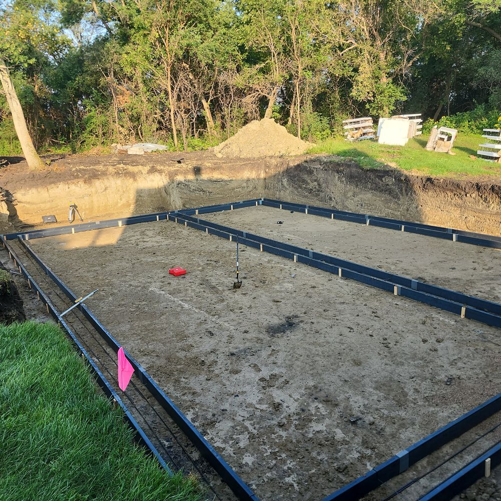 Our Concrete Foundations service offers durable, expertly crafted solutions to ensure the foundations of your home provide lasting stability and strength, enhancing the safety and longevity of your property. for Cousins Construction in Murdock, MN
