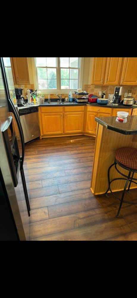 Enhance your home with our exceptional wood flooring service, offering high-quality materials and expert installation for a timeless and elegant aesthetic that will elevate the look of any room. for Reds Flooring in Boonville, IN