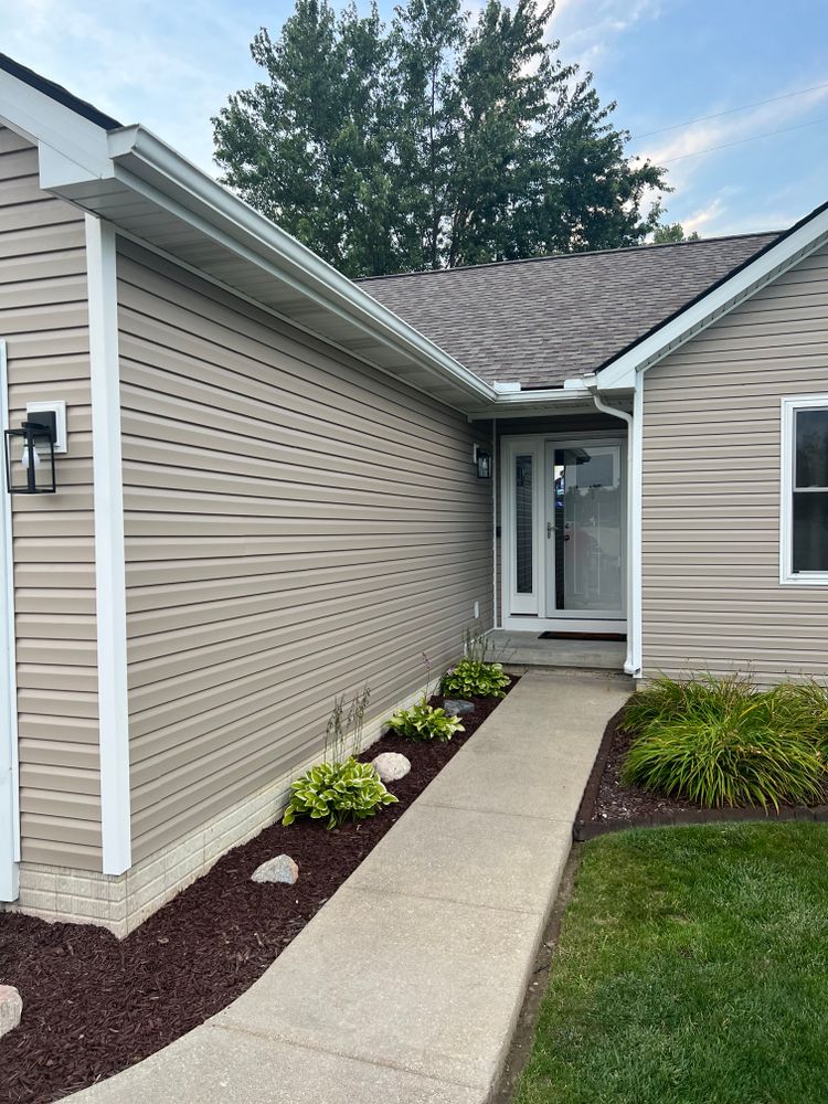 Enhance your home's durability and curb appeal with our expert siding services. Providing high-quality materials and professional installation, we ensure lasting protection against weather while boosting your property's aesthetic value. for Big Country Construction LLC in Sterling Heights, Michigan
