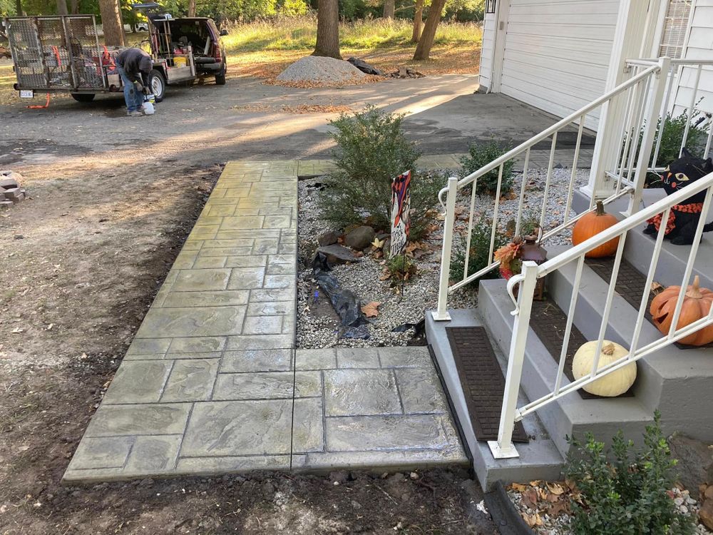 Transform your outdoor spaces with our Stamped Concrete Installation. Combining durability and elegance, we offer customizable patterns and colors to enhance the aesthetic appeal of driveways, patios, and walkways. for Snider Concrete in Springfield, IL