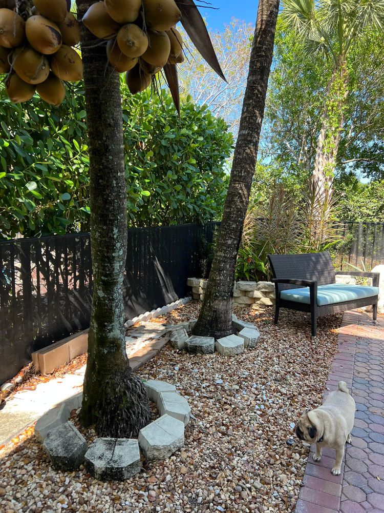 Transform your outdoor space with our Patio Design & Construction service. We create custom patios using top-quality materials, enhancing functionality and aesthetics to perfectly complement your home and lifestyle. for An Extravagant Landscape & Lawn Service in Delray, FL