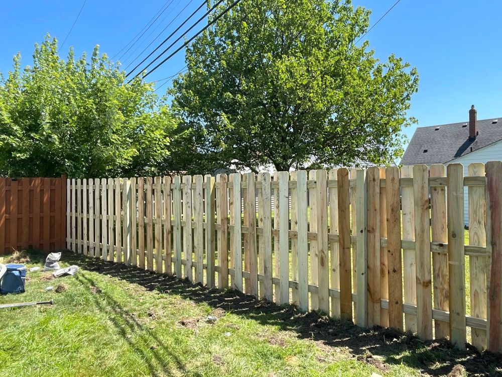 Enhance your property's curb appeal with our Custom Fence Design service. We specialize in creating unique, durable fences and offer expert fence repair to maintain the integrity of your investment. for Reynoso’s Fencing & Lawn Care in Painesville, OH