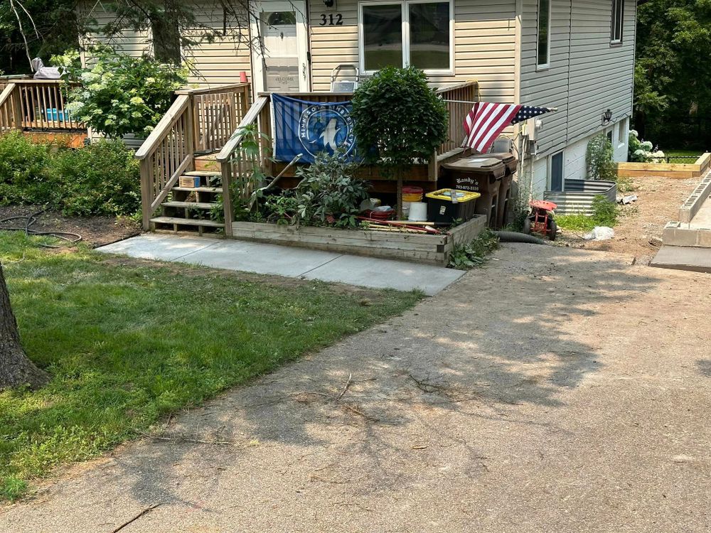 Transform your outdoor space with our Sidewalk Installation service. Our experienced team will install a durable and visually appealing concrete sidewalk that enhances the curb appeal of your home. for Mccoy Concrete Inc.  in Buffalo, MN