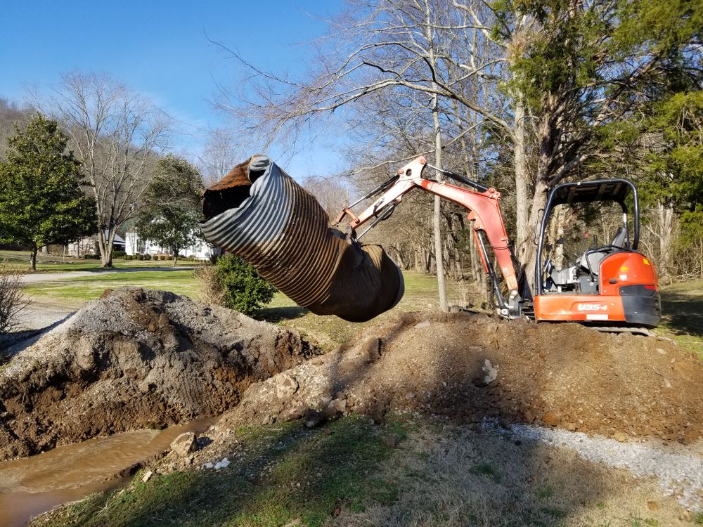 Our Drainage service ensures efficient water management, preventing erosion and pooling. We customize solutions to protect your landscape investment, enhance property value, and maintain a safe, beautiful outdoor environment. for CODE 3 Landscaping & Lawn Care in  Leoma,  TN