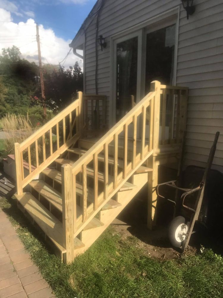 Transform your outdoor space with our expert Deck & Patio Installation service. We create stylish, durable designs tailored to enhance your home’s beauty and functionality, providing a perfect area for relaxation and entertainment. for Caprari Construction in Bloomsbury, NJ