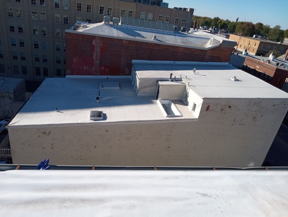 Our Roofing Replacement service ensures your home is protected with durable, high-quality materials and expert craftsmanship, providing peace of mind through enhanced safety, energy efficiency, and aesthetic appeal. for Flat Roof Systems - Construction Specialists in Findlay, OH