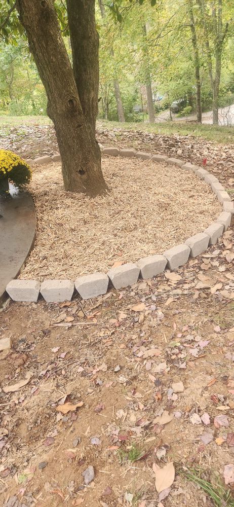 Enhance your garden's aesthetic appeal with our Mulch Installation service. Our team will expertly spread mulch to suppress weeds, retain moisture, and improve soil health for a vibrant landscape. for JC Landscapers in Ellijay, GA