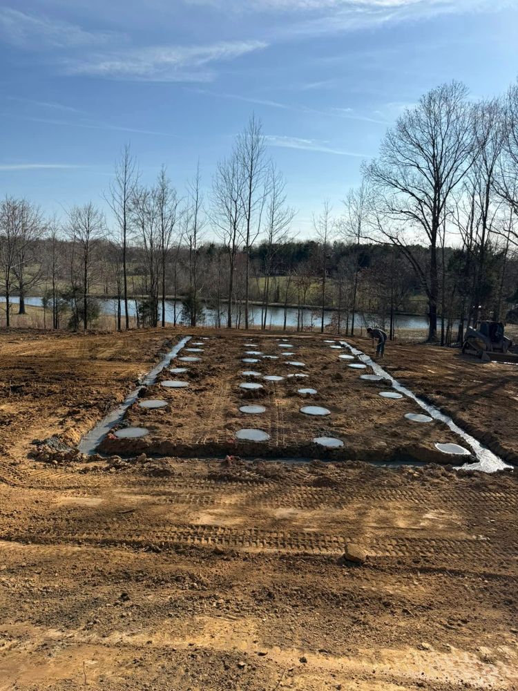 Our Residential & Commercial Excavation service ensures precise, efficient groundwork for your projects. Trust us to expertly prepare land for construction, landscaping, or utility installations with minimal disruption and exceptional attention to detail. for West TN Dirt Works in Lexington, TN