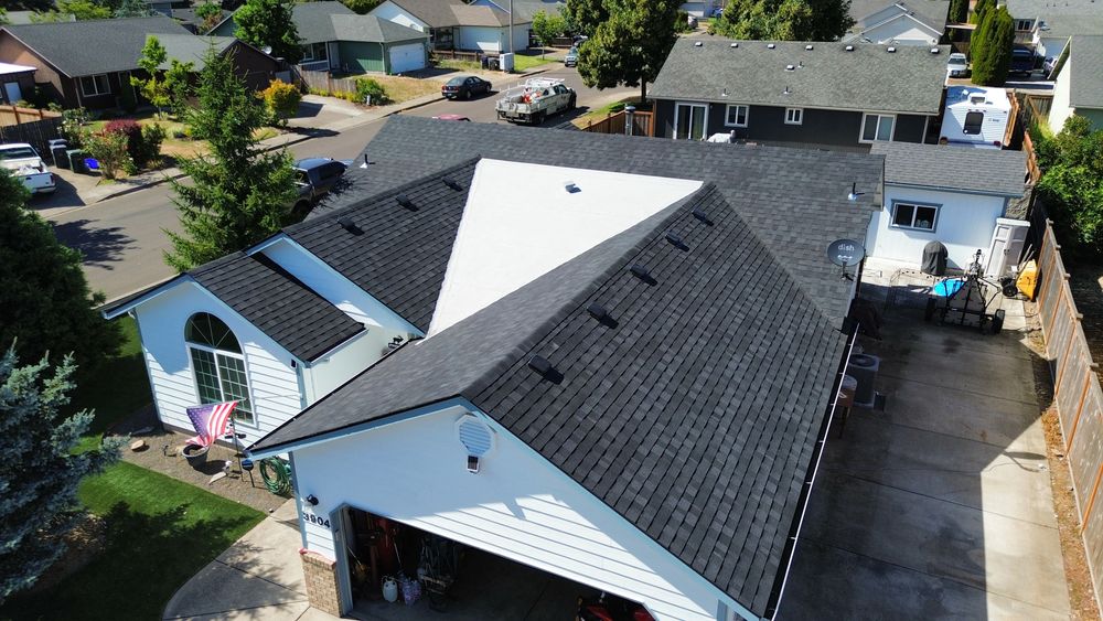 Our expert team provides professional roofing installation services to protect your home and family. With high-quality materials and skilled craftsmanship, we ensure a durable and stylish roof for years to come. for Oregon Shield Roofing and Construction LLC in Springfield , Oregon