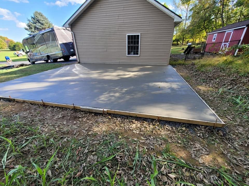 Our Concrete Slab Construction service provides durable, precisely crafted slabs tailored to your home improvement needs, ensuring a solid foundation for patios, driveways, or extensions with exceptional attention to quality and detail. for C&T Concrete in Frederick, MD