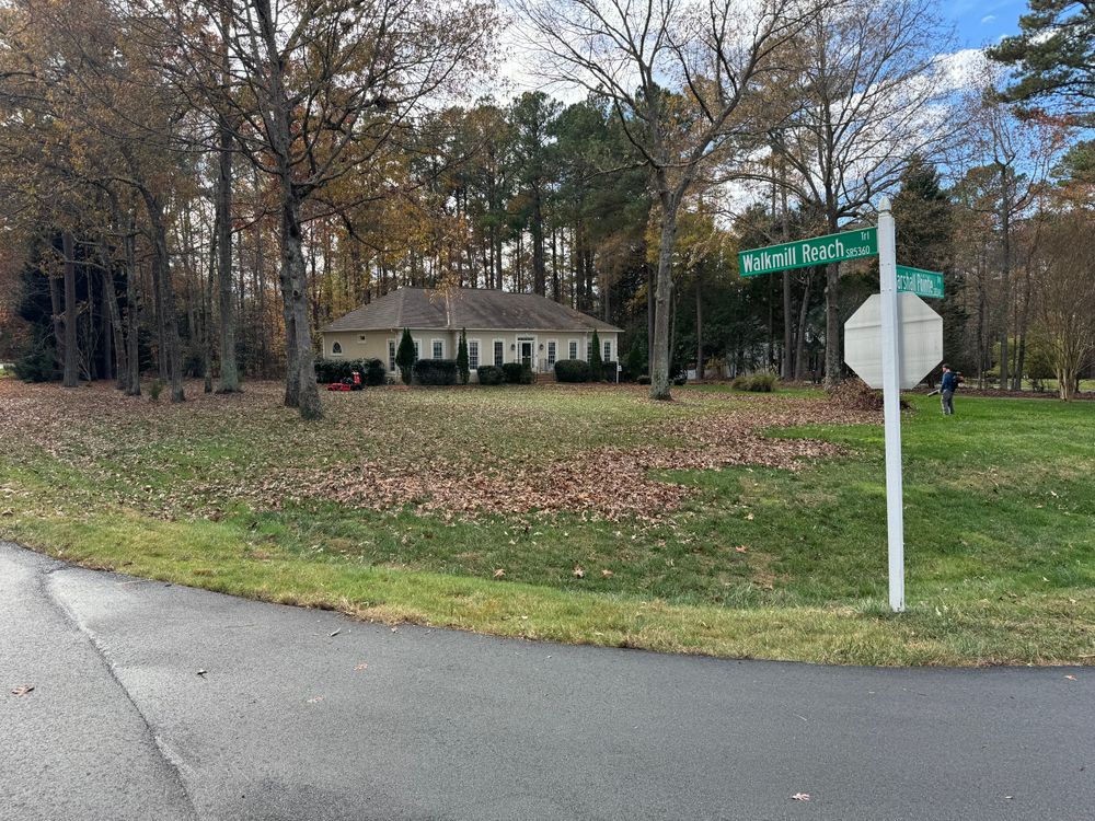 Our Fall and Spring Clean Up service includes raking leaves, removing debris, trimming bushes, and preparing your lawn for the changing seasons to maintain a beautiful landscape year-round. for Robbie's Lawn & Landscape in Chesterfield, VA
