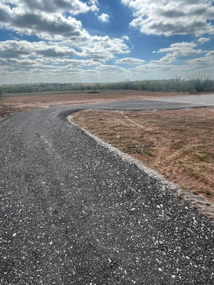Transform your home's curb appeal with our expert driveway construction service. We deliver durable, aesthetically pleasing driveways tailored to your needs, enhancing functionality and increasing property value effortlessly. for Williams & Sons Solutions in Floresville, TX