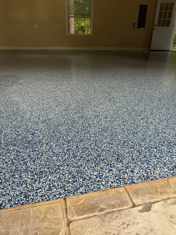 Transform your home with our durable, stylish epoxy floor coating. Our expert team ensures a seamless finish that's resistant to stains and scratches, enhancing both the beauty and longevity of your floors. for Mitchell’s Concrete Coatings in Taylorsville, NC