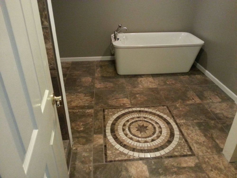 Our professional bathroom renovation service transforms your space with expert craftsmanship, tailored designs, and high-quality materials to enhance functionality and aesthetics while increasing your home's value. for Top Tier Construction in Evansville, IN