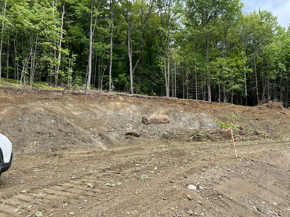 Carving a Pond into a Mountain Side for Andy Naylor Excavation in Johnson, VT