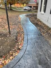 Transform your outdoor space with our expert sidewalk installation service, ensuring durability and aesthetics. Our skilled team uses top-quality materials to provide a safe, beautiful path for your home. for Sebree-84, LLC in Hebron, KY