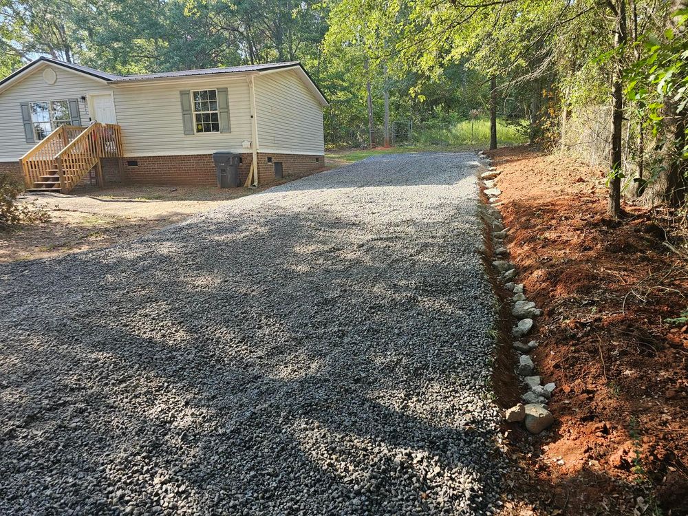 Our Roadbeds service provides durable, expertly constructed foundations for driveways and private roads, ensuring long-lasting stability and smooth surfaces tailored specifically to your property's unique requirements. for O'Connor Clearing and Hauling LLC in Anderson County, SC