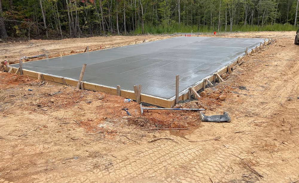Our Concrete Slab Construction service ensures durable, high-quality slabs for foundations, patios, and driveways. We prioritize precision and efficiency to enhance your property’s value and provide a reliable base for any structure. for Kerley's Concrete in Lancaster, SC