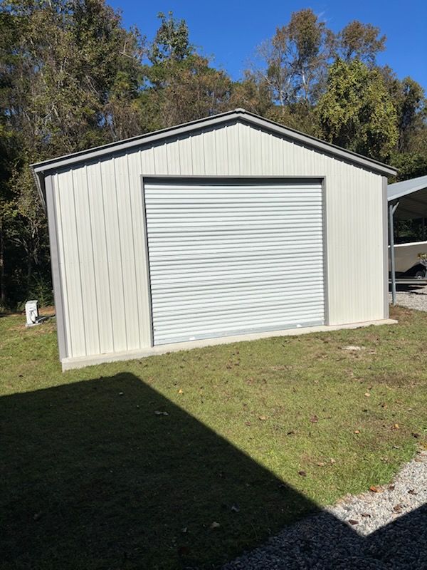 Our carports metal solutions offer durable and stylish protection for your vehicles, enhancing your home's value with customizable designs that blend seamlessly with any property, built to withstand various weather conditions. for Ryan's Trailer Carport Sales in Whiteville, NC