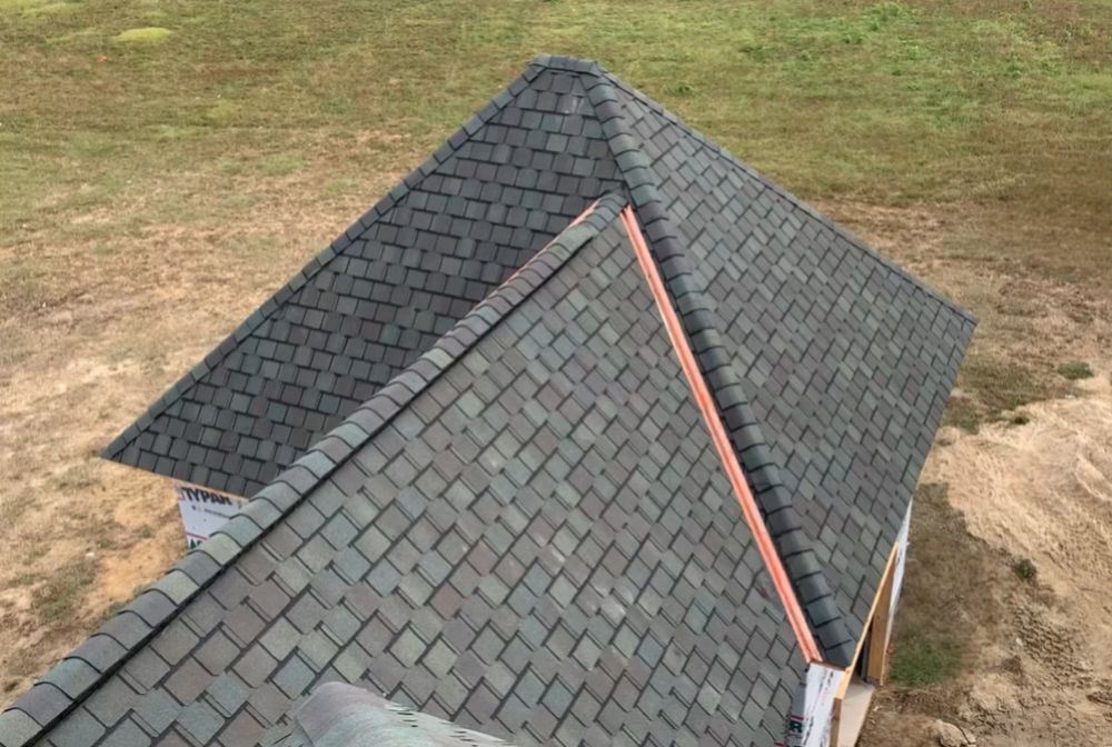 Our Roofing Installation service offers homeowners reliable, high-quality roofing solutions using durable materials and skilled craftsmanship to ensure long-lasting protection for your home with a focus on safety and customer satisfaction. for Crown Brothers in Greenville, NC