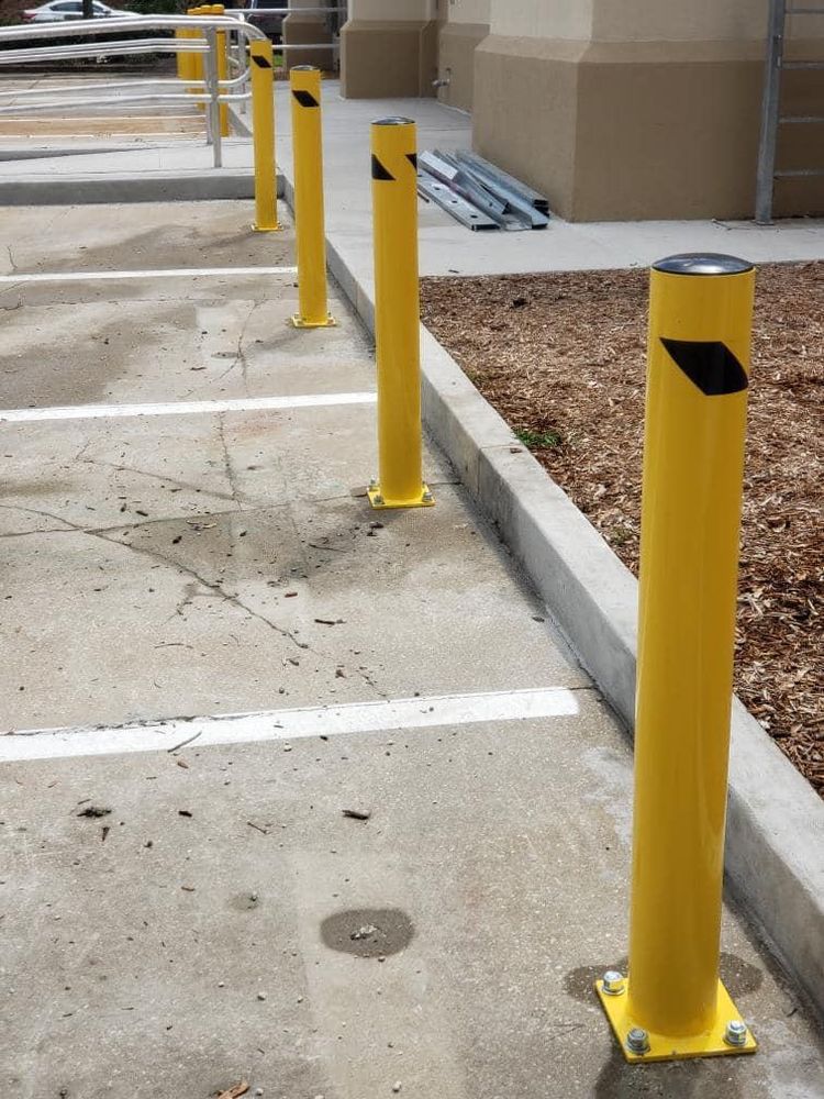 We can install concrete or steel bollards to create a protected and aesthetically pleasing parking lot. Our team of experienced professionals will ensure the job is done right! for Green Hammer Concrete in Palm Bay, Florida