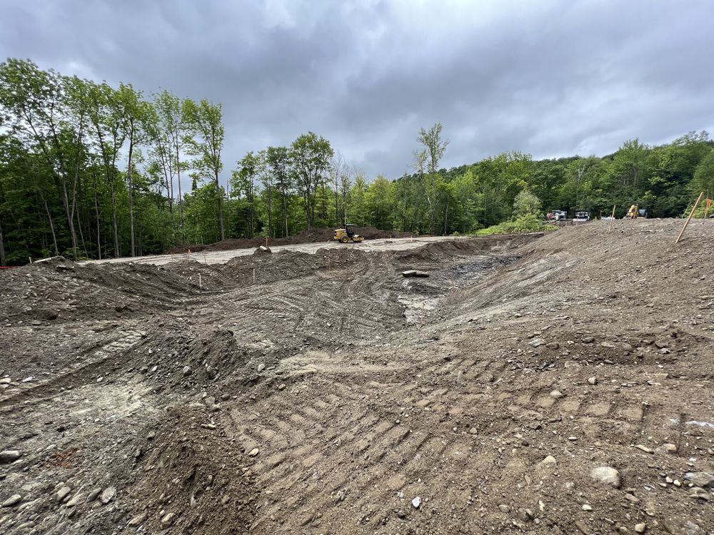 Carving a Pond into a Mountain Side for Andy Naylor Excavation in Johnson, VT