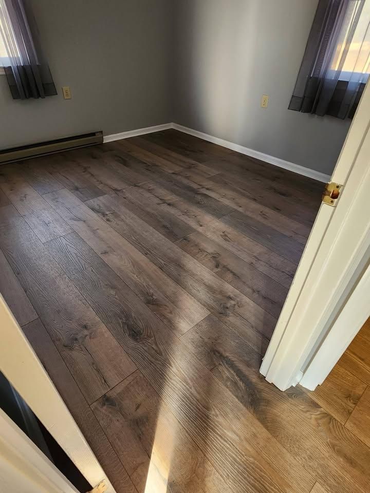 Our flooring services offer expert installation and repair for hardwood, tile, laminate, and more. Transform your home with quality craftsmanship that ensures durability and enhances the beauty of every room. for CDM Handyman Services in Mount Airy, NC