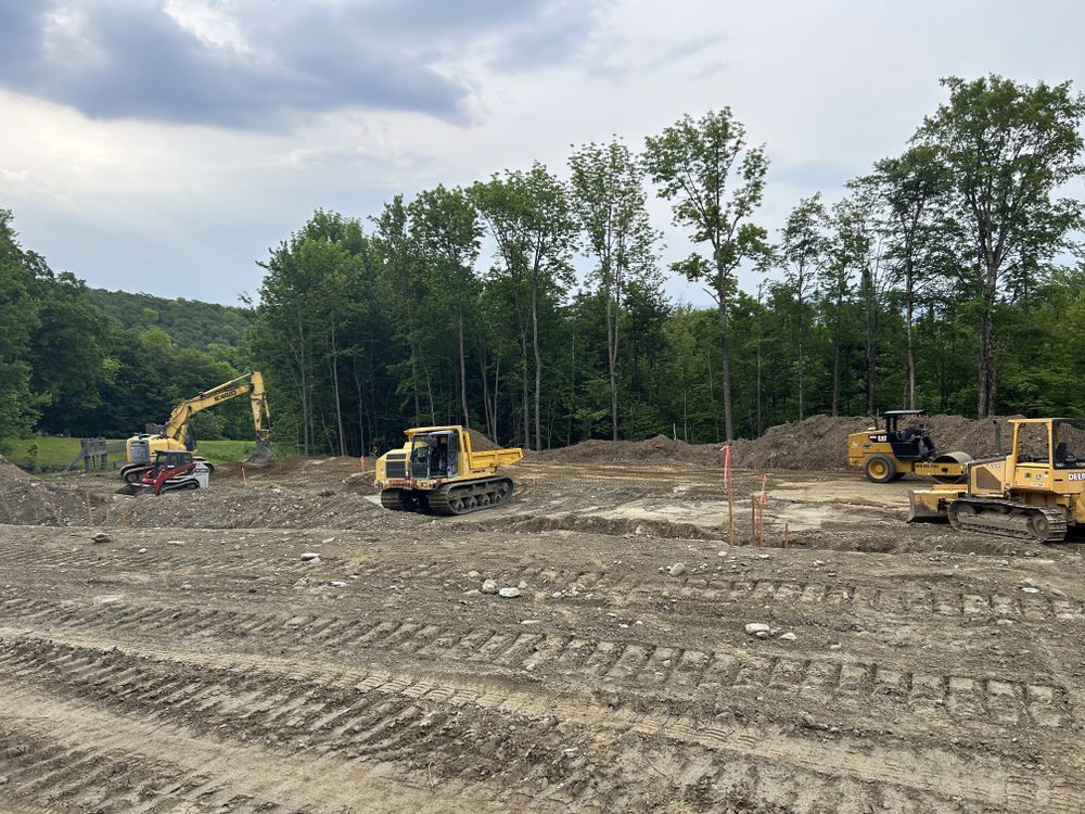 Carving a Pond into a Mountain Side for Andy Naylor Excavation in Johnson, VT