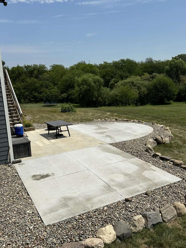 Transform your outdoor space with our Patio Design & Installation service—expertly crafted concrete patios that blend aesthetics and functionality to create the perfect setting for relaxation and entertainment at home. for New Age Concrete in Perry, IA