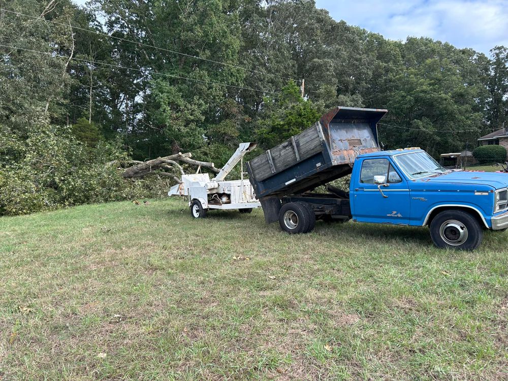 Our Debris Removal service ensures a clean and safe environment for your property by efficiently clearing away all unwanted waste and materials using professional equipment and expertise. for JHC Excavation LLC in Hartwell, GA