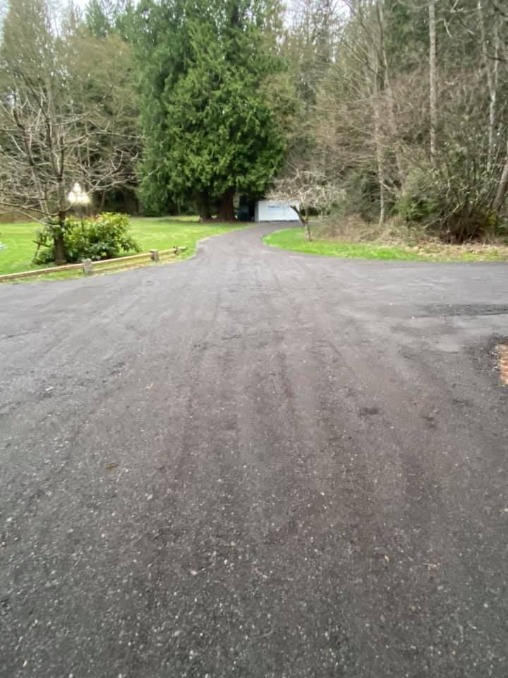 Our driveway repair service includes filling potholes, cracks, and uneven surfaces to improve the appearance and functionality of your driveway. Trust us for quality workmanship and reliable service. for AR Trucking & Excavation LLC in Stanwood, WA