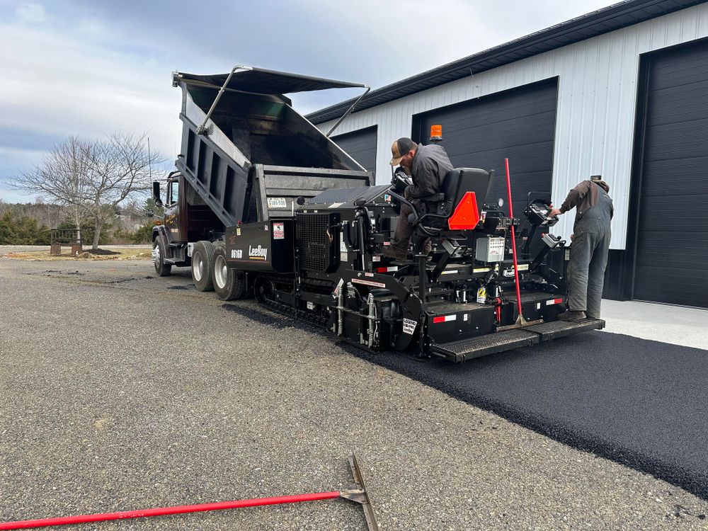 Upgrade your home with a durable and sleek asphalt driveway from our expert team. Enhance curb appeal, increase property value, and enjoy long-lasting quality with our professional asphalt paving service. for James R Carter Paving in Roanoke, VA