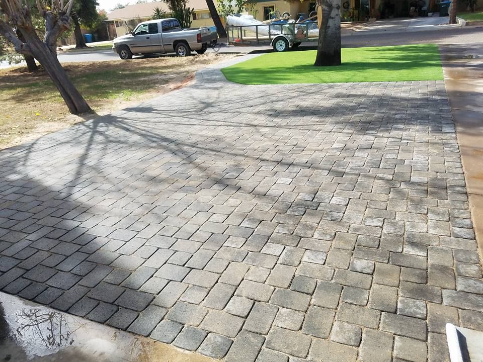 Enhance your outdoor living space with our expert patio design and construction services, offering personalized layouts and high-quality materials to create the perfect blend of style, comfort, and functionality for your home. for Green landscape in Chandler, AZ