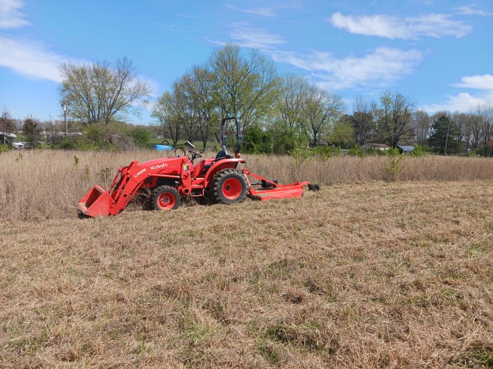 Enhance your property's appearance with our expert bush hogging and brush cutting services, removing overgrown vegetation efficiently to create clean, manageable landscapes while promoting healthier growth for your lawn and garden. for CODE 3 Landscaping & Lawn Care in  Leoma,  TN