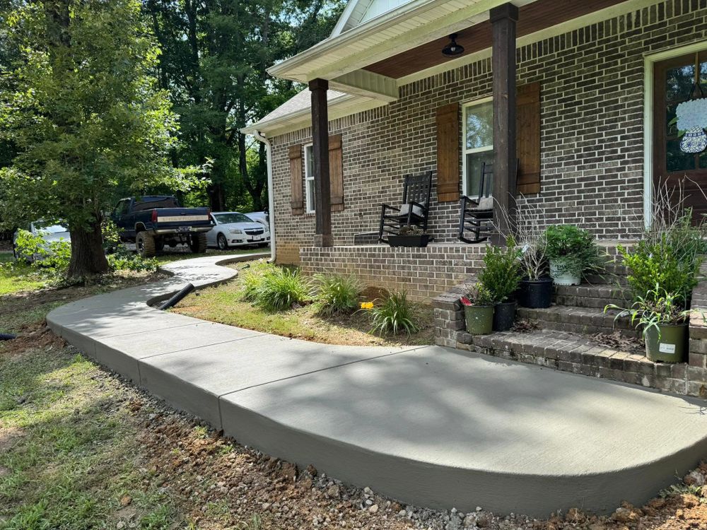 Transform your outdoor space with our expert Patio Design & Installation service. We create beautiful, durable patios tailored to your style and needs, enhancing both functionality and curb appeal. for Ramsey Concrete Construction in Covington, TN