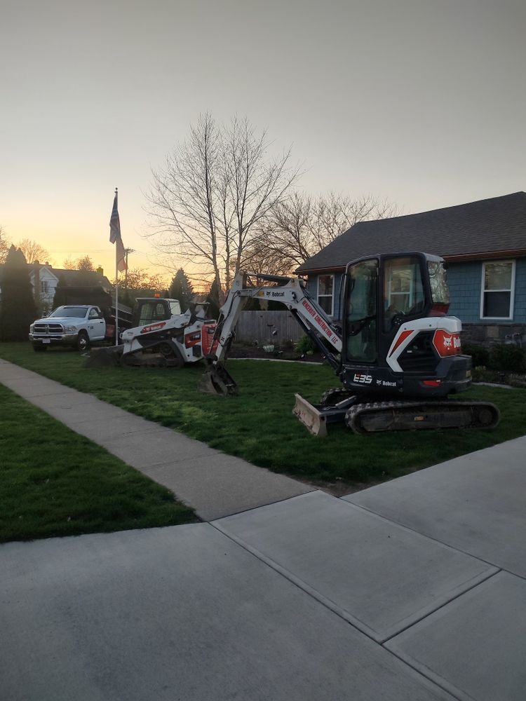 Enhance your home's curb appeal with our premium sidewalk installation service. Our expert team ensures durable, aesthetically pleasing concrete walkways that complement your landscape while guaranteeing safety and functionality for years to come. for Henceroth Construction in Amherst, OH