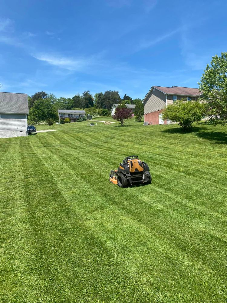 Our lawn maintenance service ensures a pristine, well-manicured yard by offering regular mowing, trimming, and care, tailored to your landscape needs. Enhance your home's curb appeal with our expert assistance today. for Leal’s Lawn Service and Excavation in Dayton, TN