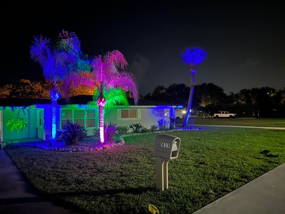 Our Landscape Lighting service will provide your home with a beautiful and safe outdoor lighting system that enhances the beauty of your landscape. for Cunningham's Lawn & Landscaping LLC in Daytona Beach, Florida