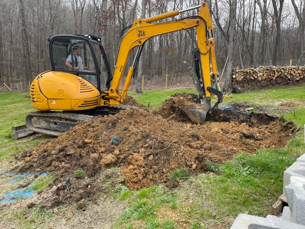 Our Residential & Commercial Excavation service efficiently handles site preparation, grading, and trenching projects with precision and care, ensuring a solid foundation for your construction needs while prioritizing safety and professionalism. for J.P Landscaping and excavation in Chattanooga, TN