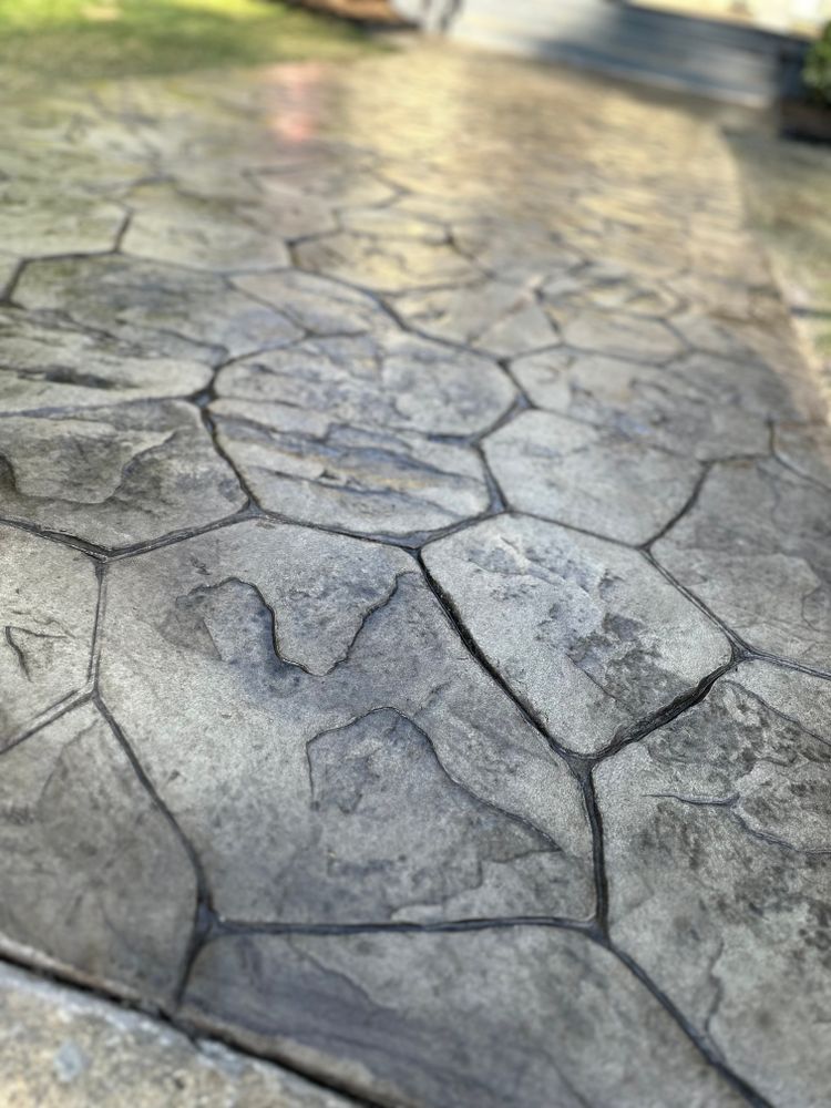 Transform your backyard with our Outdoor Living service, featuring custom concrete patios, fire pits, and walkways designed to enhance beauty and functionality for unforgettable outdoor experiences at home. for Kings Concrete & Construction in Tuscaloosa, AL