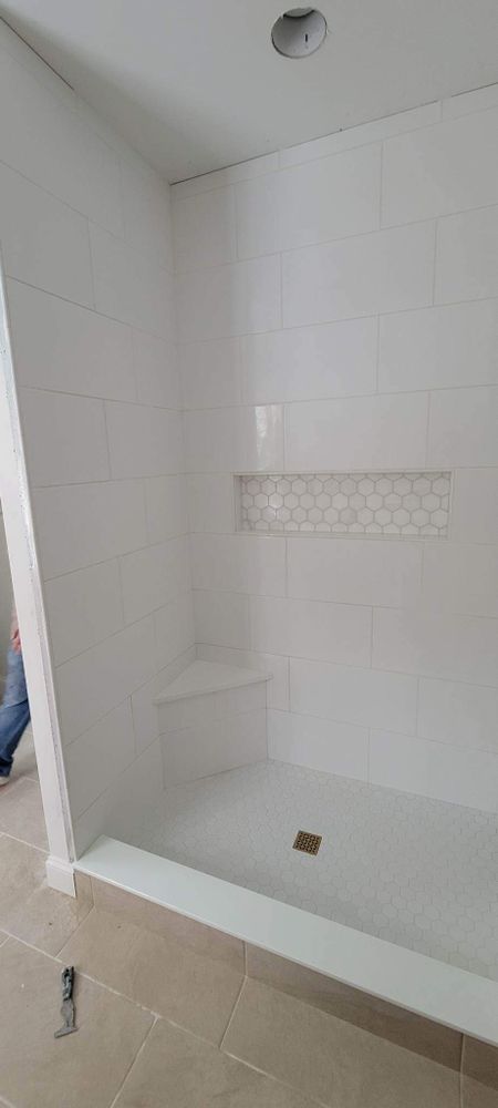 Our Shower Tiling service provides expert installation and customization options to transform your bathroom into a stylish oasis with durable and water-resistant tiles. for P&L Tile in Londonderry, NH