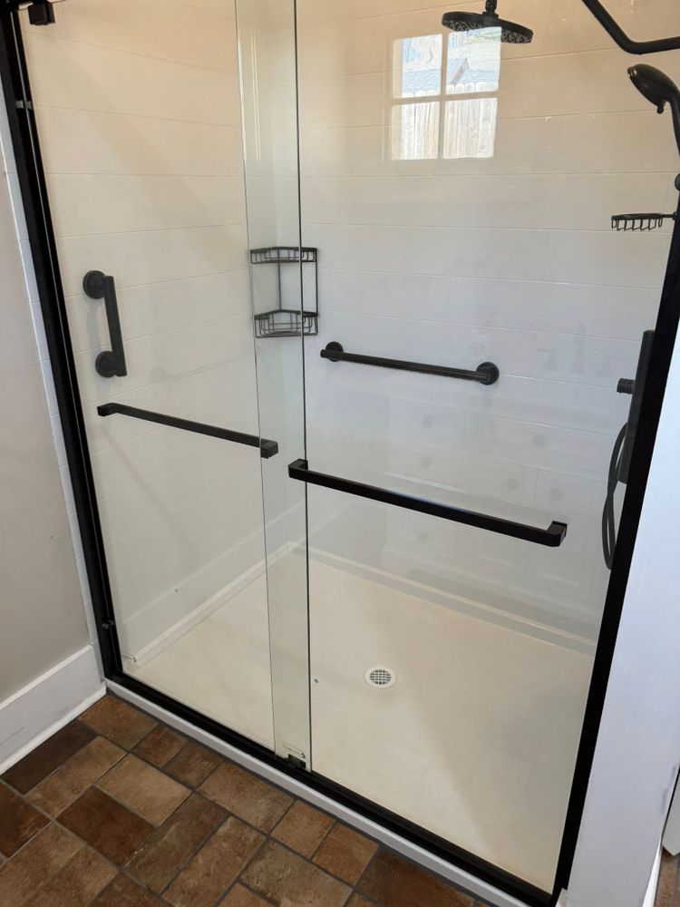 Transform your bathroom into a modern sanctuary with our expert renovation services, offering customized designs, quality materials, and professional installation to enhance functionality and aesthetic appeal in every detail. for Newbury Construction & Remodeling LLC in Trenton, TN